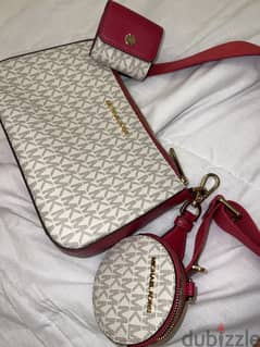 Michael Kors pink sling bag