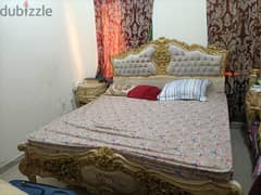 King size nice Bed and mattress with the beautiful mirror and two sid 0