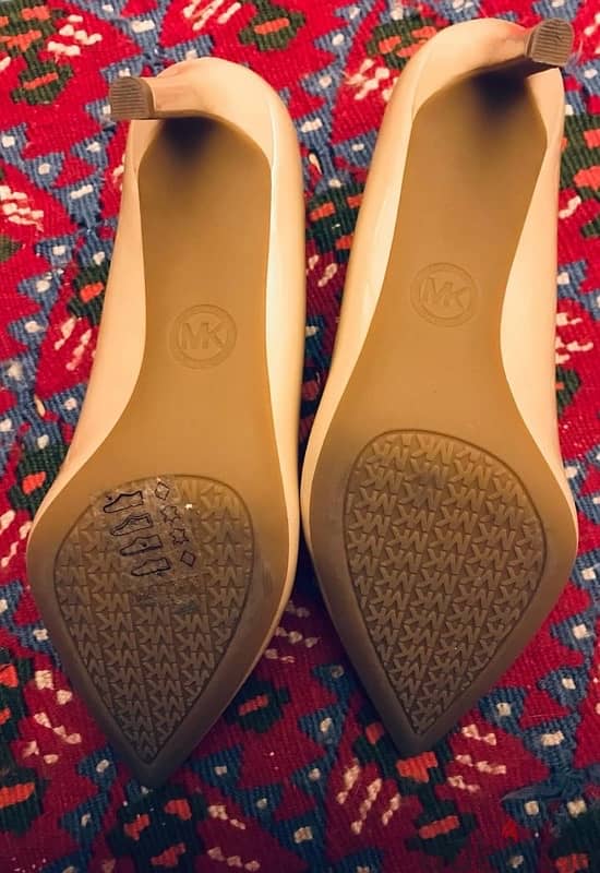 Authentic  Micheal Kors shoes 7