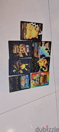 pokemon cards Pikachu black and rainbow cards 0