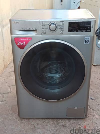 Lg 2in1 washing machine for sell 6/4 kg. Call me 30389345