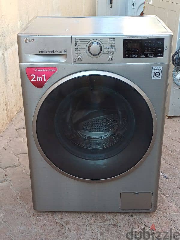 Lg 2in1 washing machine for sell 6/4 kg. Call me 30389345 0