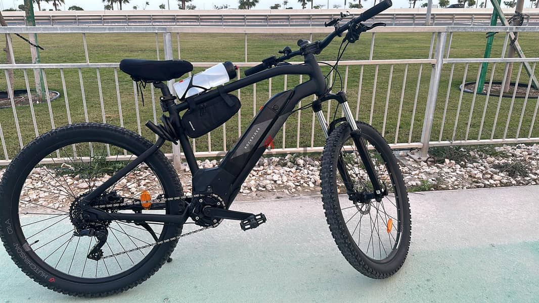 Mountain Bike battery assisted pedaling with gear 1