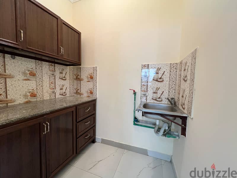 Unfurnished studio fo rent at AL THUMAMA 1