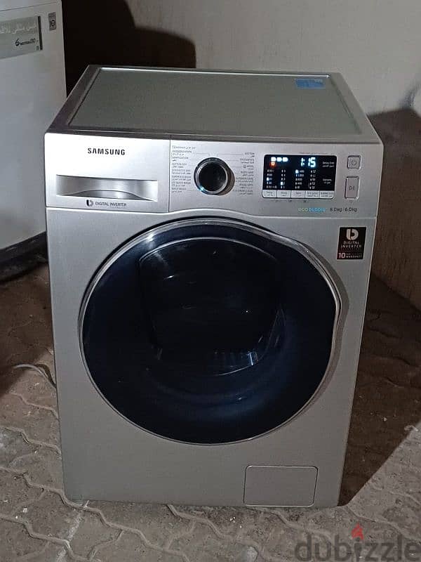 SAMSUNG 8/6 KG WASHING MACHINE FOR SALE GOOD QUALITY CALL ME. 70697610 0