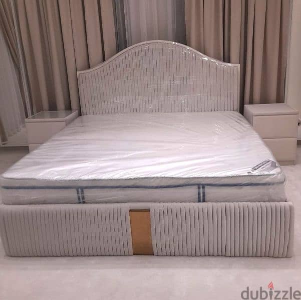 Bed and mattress and dressing. 3