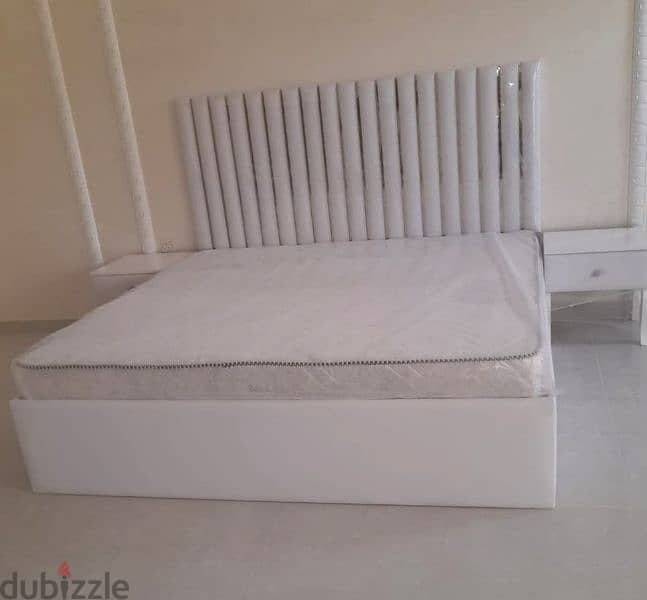 Bed and mattress and dressing. 4