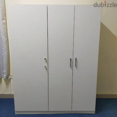 For sell 3 door cabinet.  from ikea.  call 31591075