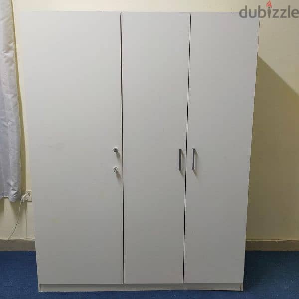 For sell 3 door cabinet.  from ikea.  call 31591075 0