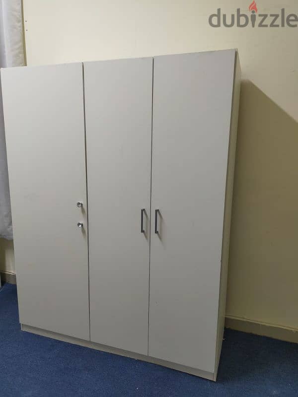 For sell 3 door cabinet.  from ikea.  call 31591075 2