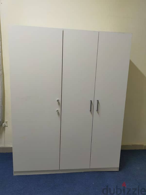 For sell 3 door cabinet.  from ikea.  call 31591075 4