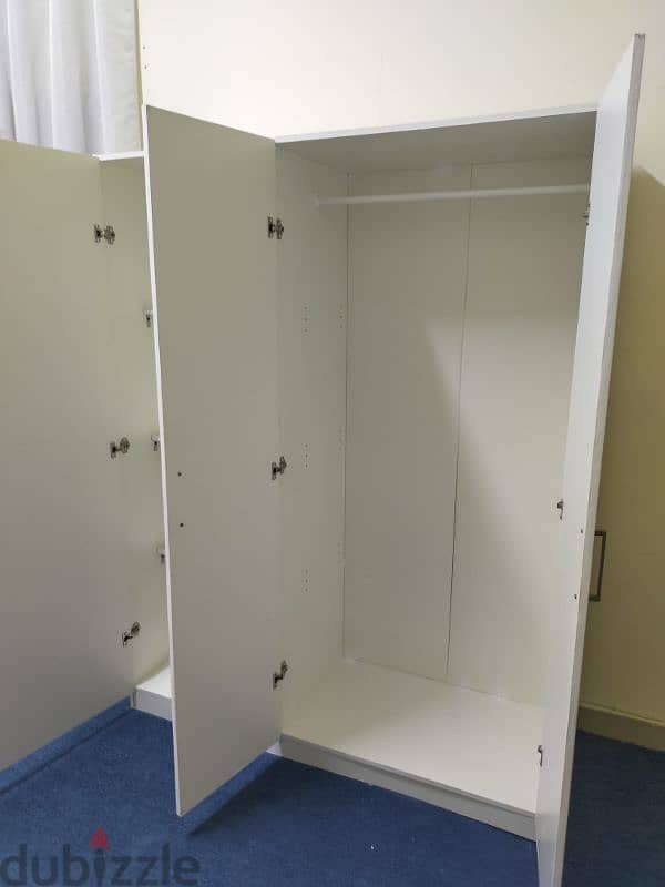 For sell 3 door cabinet.  from ikea.  call 31591075 5