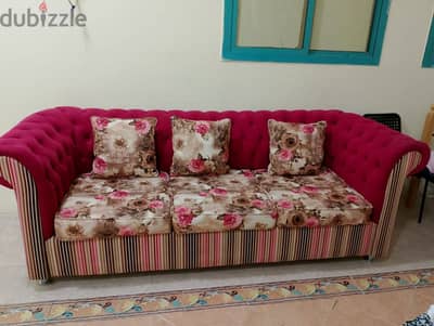 roses design sofa , two sofas available along with matching pillows