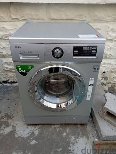 LG 8/4 KG WASHING MACHINE FOR SELL CALL ME 70577993