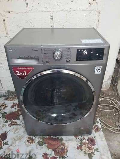 LG 7/4 KG WASHING MACHINE FOR SELL CALL ME 70577993