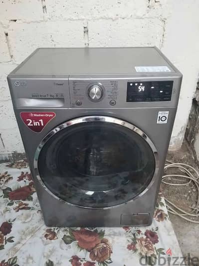 LG 7/4 KG WASHING MACHINE FOR SELL CALL ME 70577993