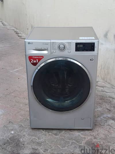 LG 8/5 KG WASHING MACHINE FOR SELL CALL ME 70577993