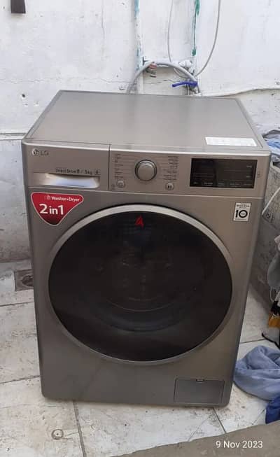 LG 8/5 KG WASHING MACHINE FOR SELL CALL ME 70577993