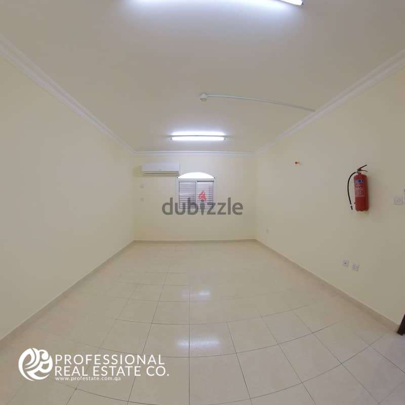 Unfurnished | 2 Bedroom Flat in Al Gharrafa | Near Family Park 0