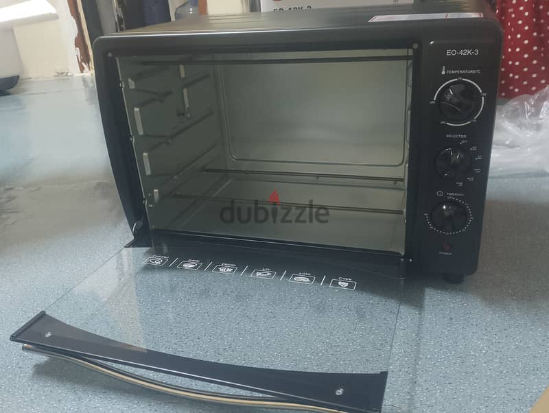 New unused electric oven with box only 250 Qatari riyals 1