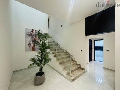 For rent, a new furnished villa in Al Thumama