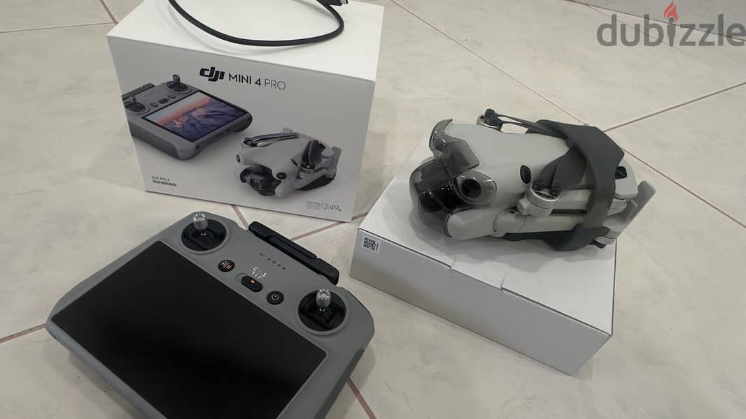 DJI - Mini 4 Pro Fly More Combo Plus Drone and RC 2 Remote Control 1