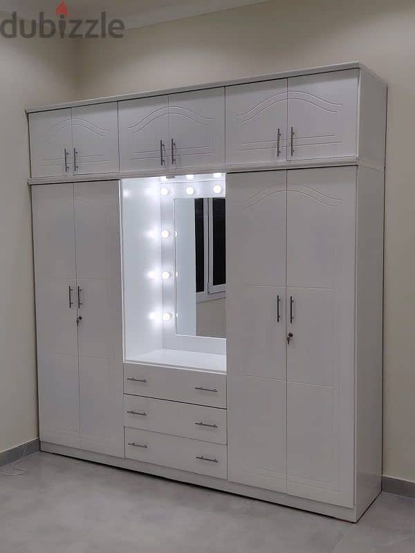 Double bed and big cupboard selling. 33757438 9