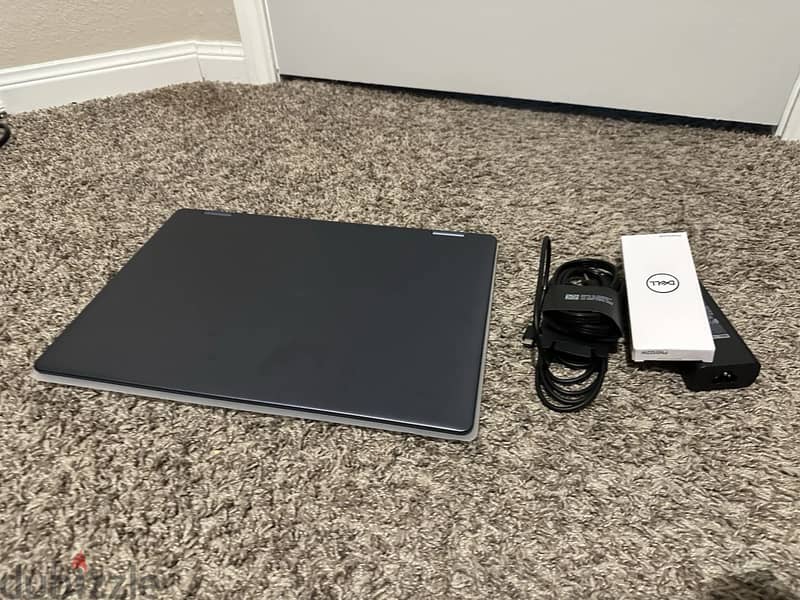 Dell Plus 2 in 1 laptop 1