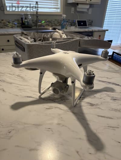 DJI Phantom 4 Pro WM331A with Controller, Charger, and Battery.