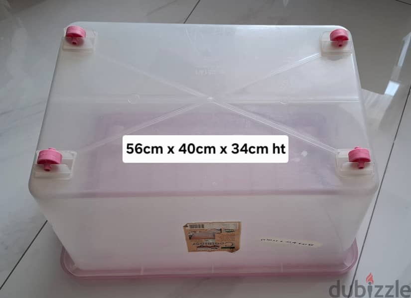 Storage Box with Lockable Blue Handles & Bottom Wheels. 2