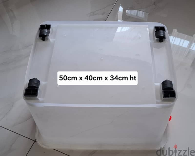 Storage Box with Lockable Blue Handles & Bottom Wheels. 4
