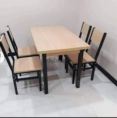 Dining table and chairs selling new. 30032896
