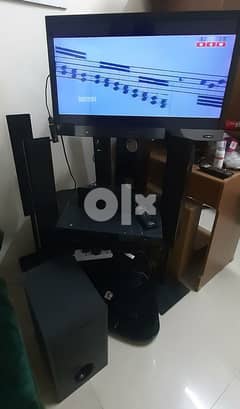 sony tv,subwoofer,stand & mi stck 0