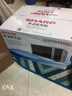 Sharp Microwave Oven Brand new still in box 0