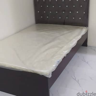 Brand New wooden bed with mattress