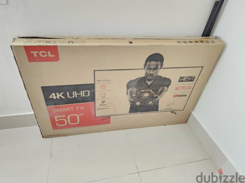 TCL 50" 4K UHD Smart TV + Wall Mount 7