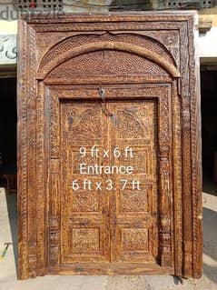 Main entrance door, wood door, antique design door. 0