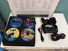 ps4 almost new with 5 games and 2 controllers 0