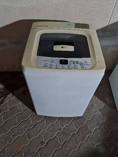 lg 7 kg top load washing for sell. call me 30389345