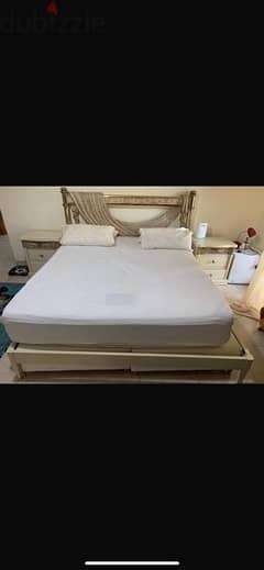 2 sets of king size beds with medical mattresses and 2 side tables