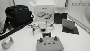DJI - Mini 2 SE Fly More Combo Drone Remote Control 0